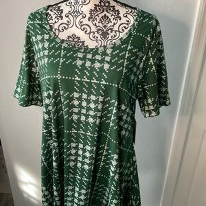 Green and white long shirt.